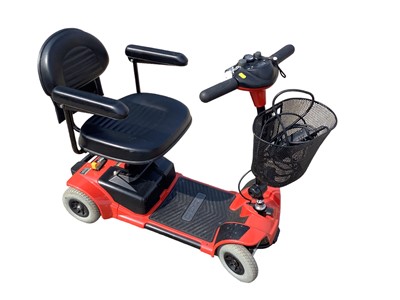 Lot 9 - Go Go mobility scooter with key and charger