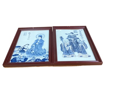 Lot 1217 - Two Chinese blue and white porcelain panels mounted in frames (2).