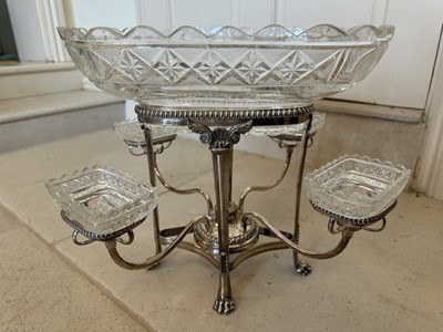 Lot 375 - Regency Old Sheffield plate and cut glass épergne, raised on lion paw feet, 35cm wide