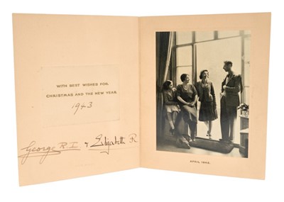Lot 15 - T.M. King George VI and Queen Elizabeth, scarce wartime 1942 Christmas card with gilt embossed crown to cover, black and white photograph of the King and Queen with their two daughters in a relaxe...