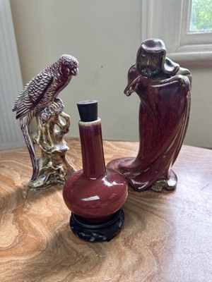 Lot 1509 - Chinese sang de boeuf standing figure, a similar parrot figure and a similar vase