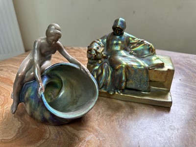 Lot 1507 - Early 20th century Zsolnay iridescent figure of Anonymous, and another. girl with shell