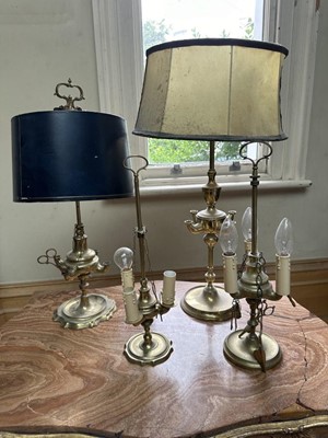 Lot 1514 - Continental bronze table lamp, in the form of a Classical style oil lamp, four others similar