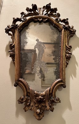 Lot 1577 - 18th century Venetian etched glass wall mirror