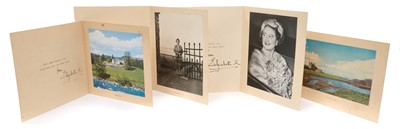 Lot 20 - H.M.Queen Elizabeth The Queen Mother, four 1950s signed Christmas cards with gilt embossed crowns to covers , photographs of Royal Castles and The Queen Mother to the interiors , all signed in ink...