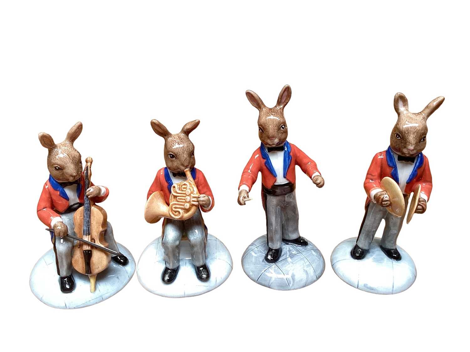 Lot 1200 - Royal Doulton limited edition Bunnykins Orchestra - The Violinist DB390, The Flute Player DB391, The Marimba Player DB392, The Cellist DB393, The Cymbal Player DB394, The French Horn Player DB395 a...