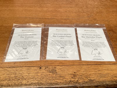 Lot 1200 - Royal Doulton limited edition Bunnykins Orchestra - The Violinist DB390, The Flute Player DB391, The Marimba Player DB392, The Cellist DB393, The Cymbal Player DB394, The French Horn Player DB395 a...