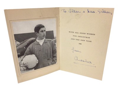 Lot 46 - H.R.H.Prince Charles The Prince of Wales (now H.M.King Charles III), scarce signed and inscribed 1969 Christmas card with gilt embossed Prince of Wales feather crest to cover, photograph of the Pr...