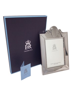 Lot 68 - H.M.Queen Elizabeth II, 2016 Royal Household Christmas present Silver plated easel photograph frame with etched crowned ERII cipher to cresting 28x19cm in original fitted box with card