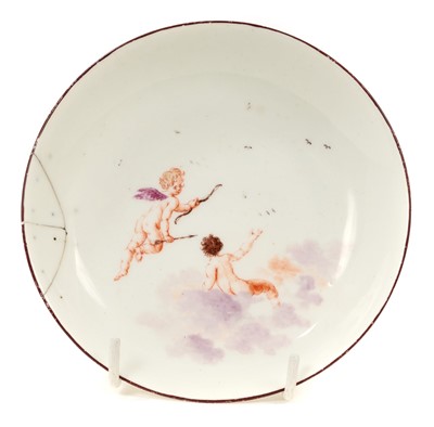 Lot 24 - Rare Chelsea saucer, painted with cherubs, circa 1755