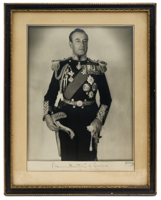 Lot 102 - H.R.H. Admiral Earl Mountbatten of Burma, fine 1940s signed presentation portrait photograph of the Admiral wearing Naval full dress uniform with Orders and Decorations, signed in ink 'Mountbatten...
