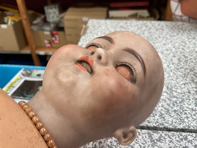Lot 1955 - Three dolls French Tete Jumeau 8 bisque head, brown fixed eyes closed mouth, painted lips lashes and brows, blonde ringlets, composite body marked Jumeau Paris. S H 1079 DEP & bisque head doll with...