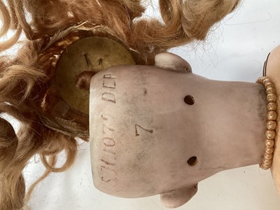 Lot 1955 - Three dolls French Tete Jumeau 8 bisque head, brown fixed eyes closed mouth, painted lips lashes and brows, blonde ringlets, composite body marked Jumeau Paris. S H 1079 DEP & bisque head doll with...