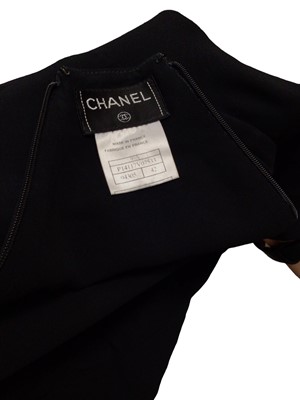 Lot 2050 - Chanel late 90s black silk crepe strapless evening gown with a black metal CC logo to the front of the bodice. Label size 42. On a Chanel hanger