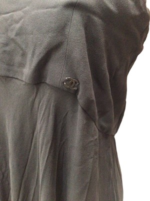 Lot 2050 - Chanel late 90s black silk crepe strapless evening gown with a black metal CC logo to the front of the bodice. Label size 42. On a Chanel hanger
