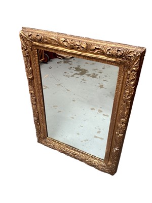 Lot 1727 - 18th/19th century gilt mirror in boldly carved frame