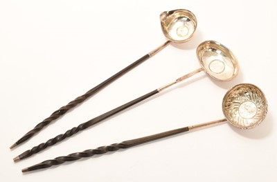 Lot 163 - Three Georgian white metal toddy ladles