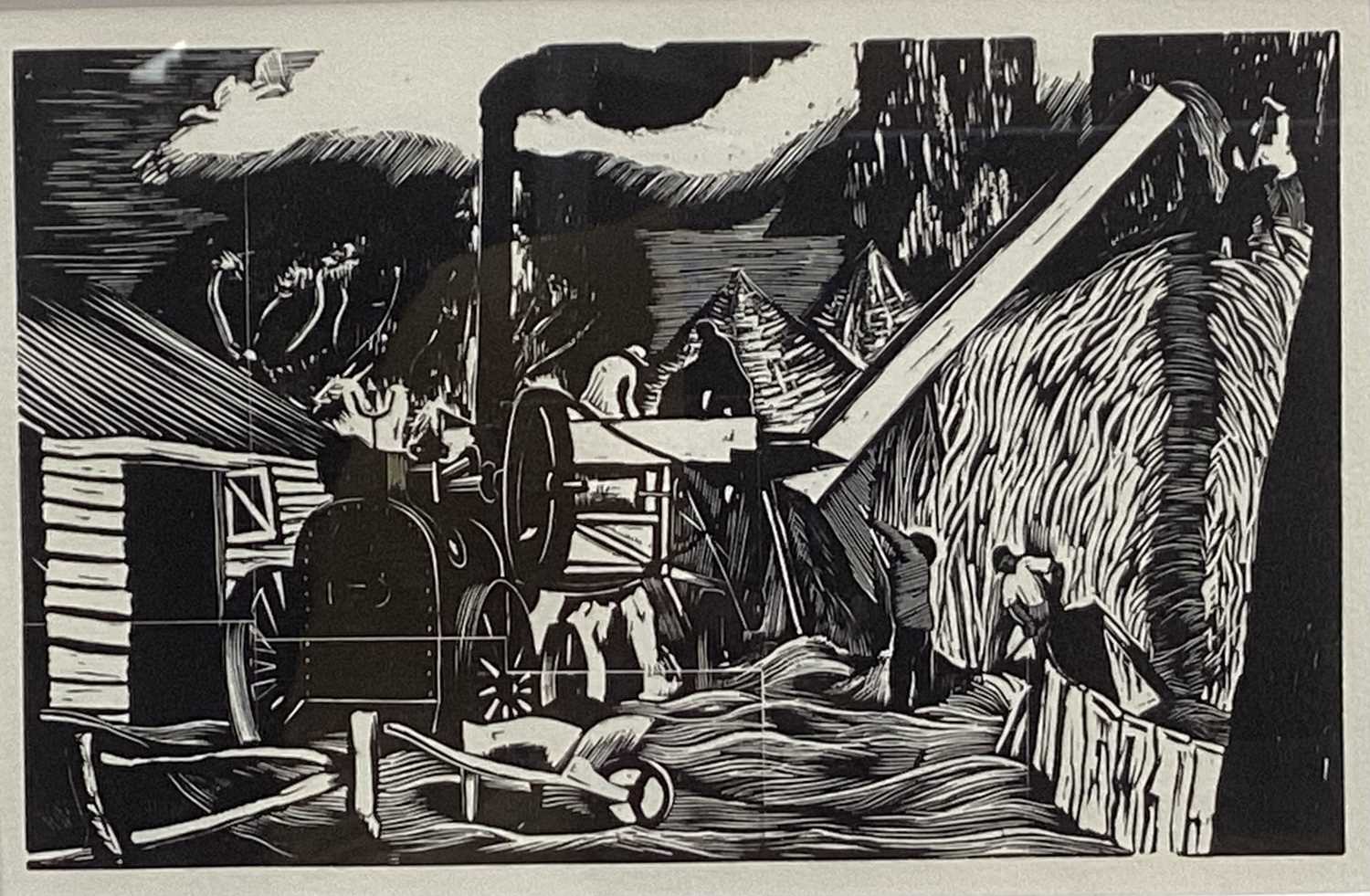 Lot 974 - *After John Northcote Nash (1893-1977) wood engraving 'The Threshing Machine', mounted in glazed frame.