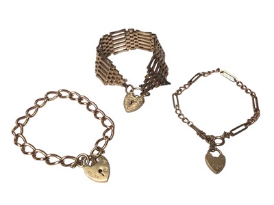 Lot 168 - 9ct gold gate bracelet and two other 9ct gold bracelets, all with padlock clasps (3)