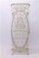 Lot 1668 - French Art Nouveau wirework Wine rack of ovoid...