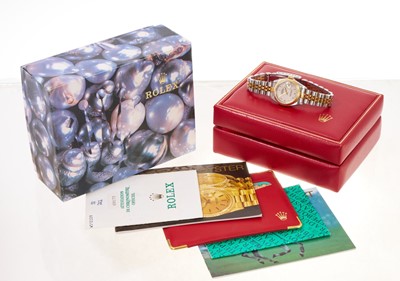 Lot 581 - Ladies Rolex Oyster Perpetual DateJust gold and stainless steel wristwatch, boxed with papers