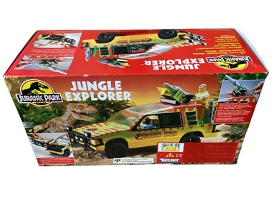 Lot 24 - Kenner (c1993) Jurassic Park Jungle Explorer & Triceratops, both boxed, plus board game (3)