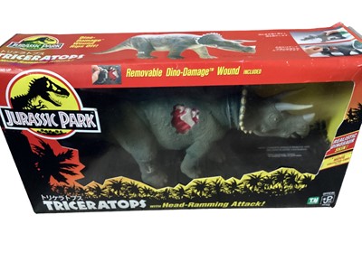 Lot 24 - Kenner (c1993) Jurassic Park Jungle Explorer & Triceratops, both boxed, plus board game (3)