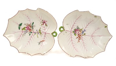 Lot 100 - Pair of Chelsea leaf shaped dishes, the undersides moulded in relief with flowers and leaves, circa 1755, one with red anchor mark