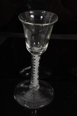Lot 254 - Three 18th century opaque twist stem glasses