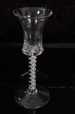 Lot 254 - Three 18th century opaque twist stem glasses