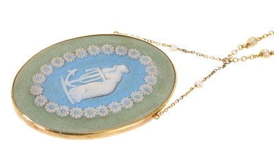 Lot 427 - Antique Wedgwood Jasperware pendant necklace, the oval panel depicitng an allegory of Hope in a 15ct gold mount suspended from a gold trace chain with seed pearl spacers, 45cm long