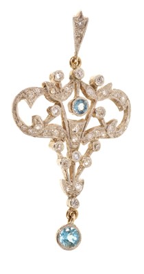 Lot 429 - Edwardian-style aquamarine and diamond pendant with two mixed cut aquamarines and old cut diamonds in openwork floral scrolls, 56mm.