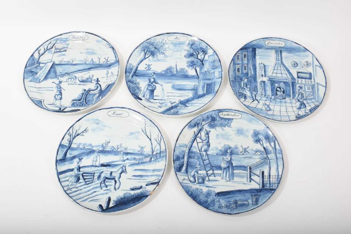 Lot 73 - Five Dutch Delft ‘calendar’ plates