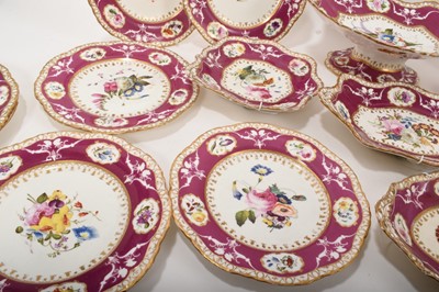 Lot 119 - 19th century Spode dessert service, painted and moulded with floral patterns on a puce and gilt ground, comprising 12 plates, 4 dishes and a centrepiece