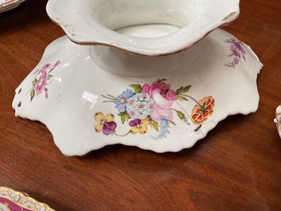 Lot 119 - 19th century Spode dessert service, painted and moulded with floral patterns on a puce and gilt ground, comprising 12 plates, 4 dishes and a centrepiece