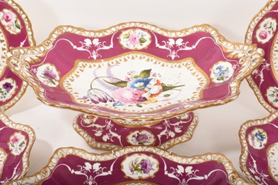 Lot 119 - 19th century Spode dessert service, painted and moulded with floral patterns on a puce and gilt ground, comprising 12 plates, 4 dishes and a centrepiece
