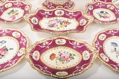 Lot 119 - 19th century Spode dessert service, painted and moulded with floral patterns on a puce and gilt ground, comprising 12 plates, 4 dishes and a centrepiece