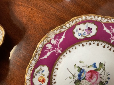 Lot 119 - 19th century Spode dessert service, painted and moulded with floral patterns on a puce and gilt ground, comprising 12 plates, 4 dishes and a centrepiece