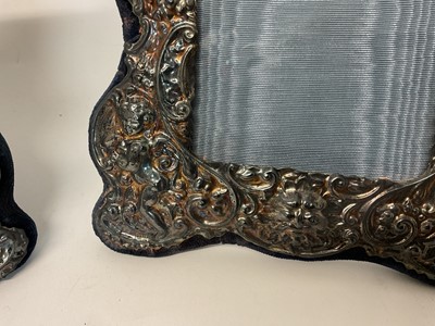 Lot 18 - Pair of silver photo frames, decorated in relief