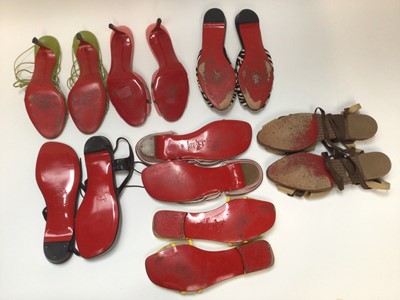 Lot 2170 - Seven pairs of Christian Louboutin sandals including a pair of unused black strap flat sandals, four other pairs of flats and two pairs of heels, sizes 39½- 40