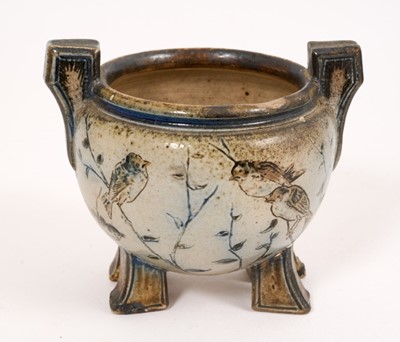 Lot 208 - Martin Brothers stoneware squat twin-handled vase, on four block feet, decorated with birds, signed to base, 9.5cm high