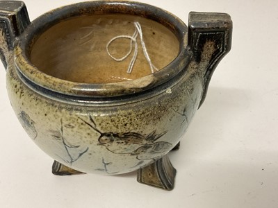 Lot 208 - Martin Brothers stoneware squat twin-handled vase, on four block feet, decorated with birds, signed to base, 9.5cm high