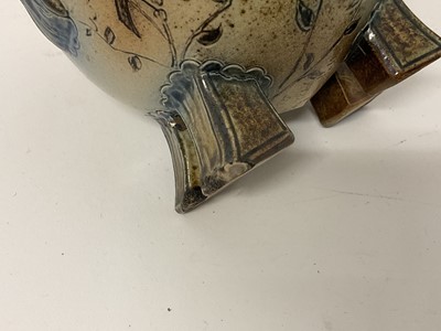 Lot 208 - Martin Brothers stoneware squat twin-handled vase, on four block feet, decorated with birds, signed to base, 9.5cm high