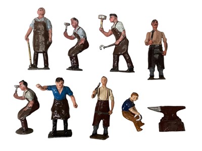 Lot 302 - Britains Village blacksmith selection including six blacksmiths / farriers, horses, anvil etc.