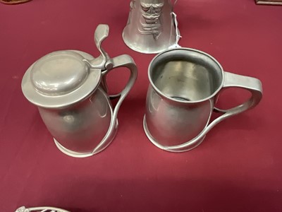 Lot 986 - Archibald Knox for Liberty Tudric lidded tankard. Model 066 and another