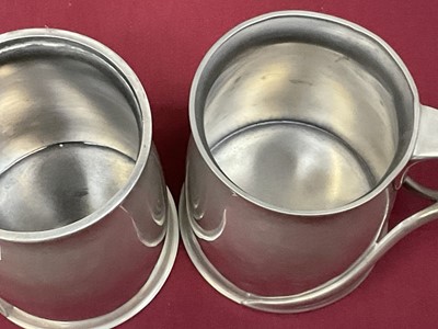 Lot 986 - Archibald Knox for Liberty Tudric lidded tankard. Model 066 and another