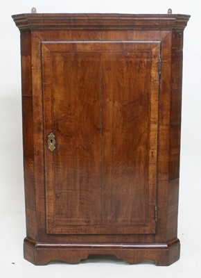 Lot 1718 - Early 18th century walnut corner cupboard