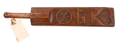 Lot 826 - Fine continental early 19th century carved fruitwood mangle board