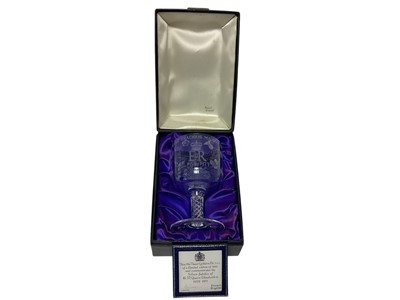 Lot 382 - The Silver Jubilee 1977, Stuart Crystal commemorative goblet with cut and etched crowned ERII 1952-1977 decoration on air twist stem and splayed foot 17.5cm high,limited edition no.342/500 with...