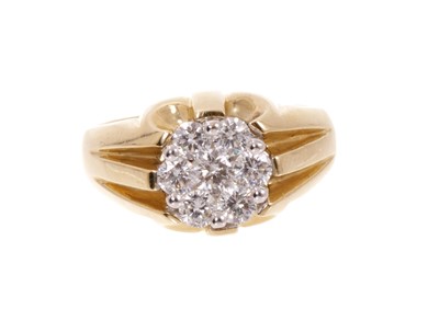 Lot 718 - Diamond cluster signet ring with a cluster of seven brilliant cut diamonds estimated to weigh approximately 1ct in total, in heavy 9ct gold claw setting on tapered shank